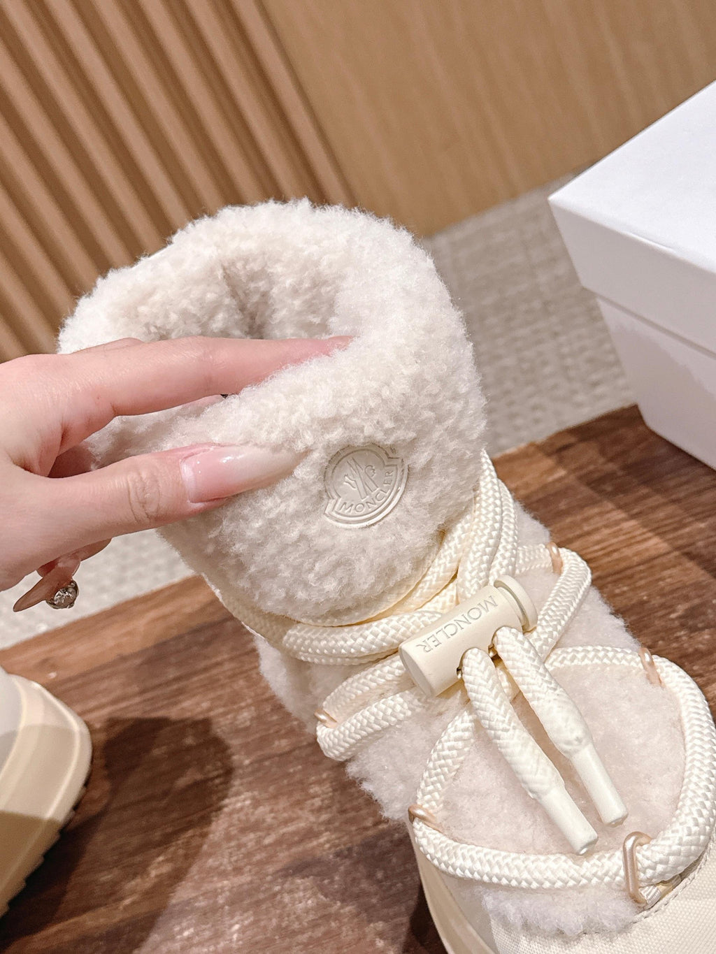 Moncler cream shearling boot, heel strap and lace detail with side logo