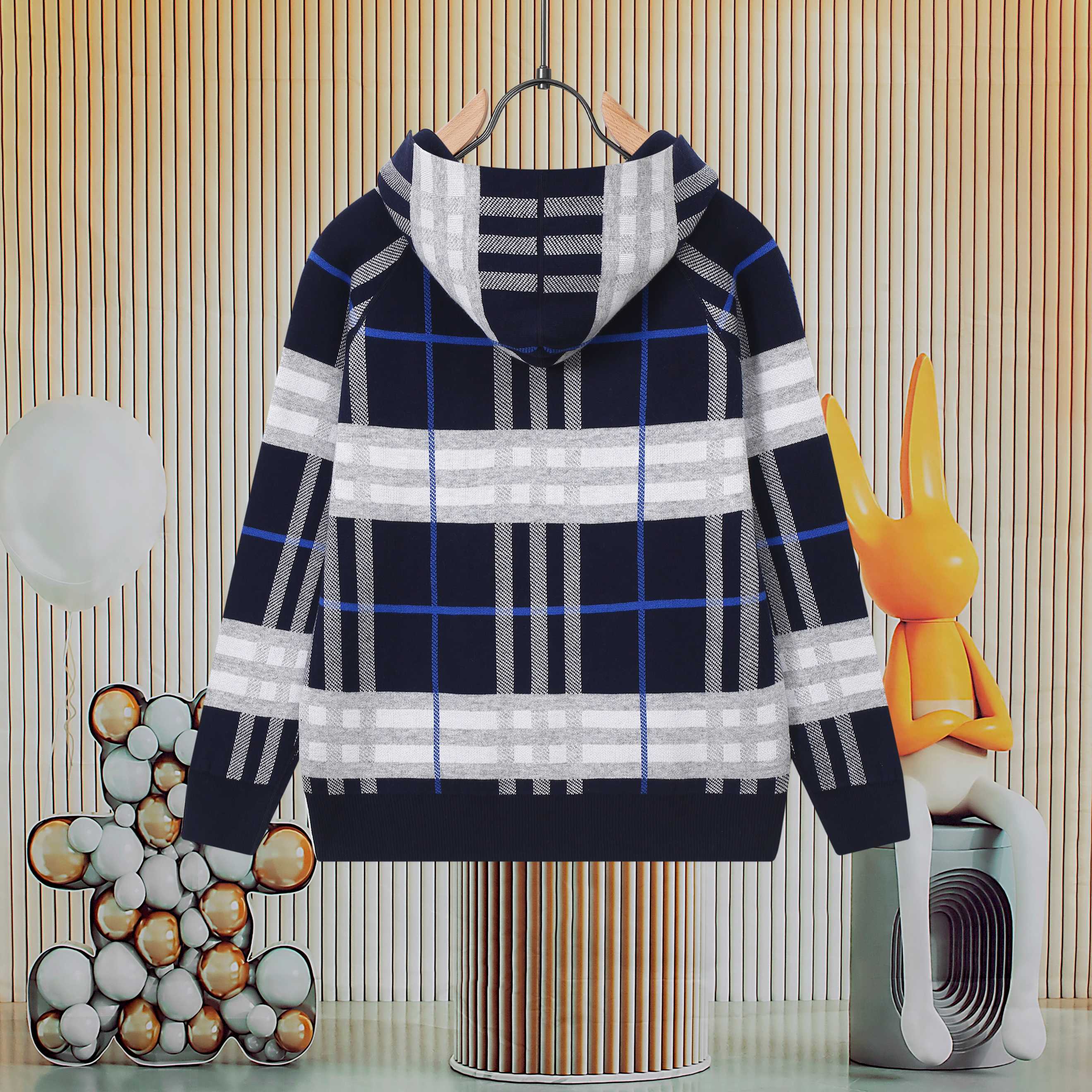 Children's navy plaid zip-up hoodie with white and blue check blocks and hood