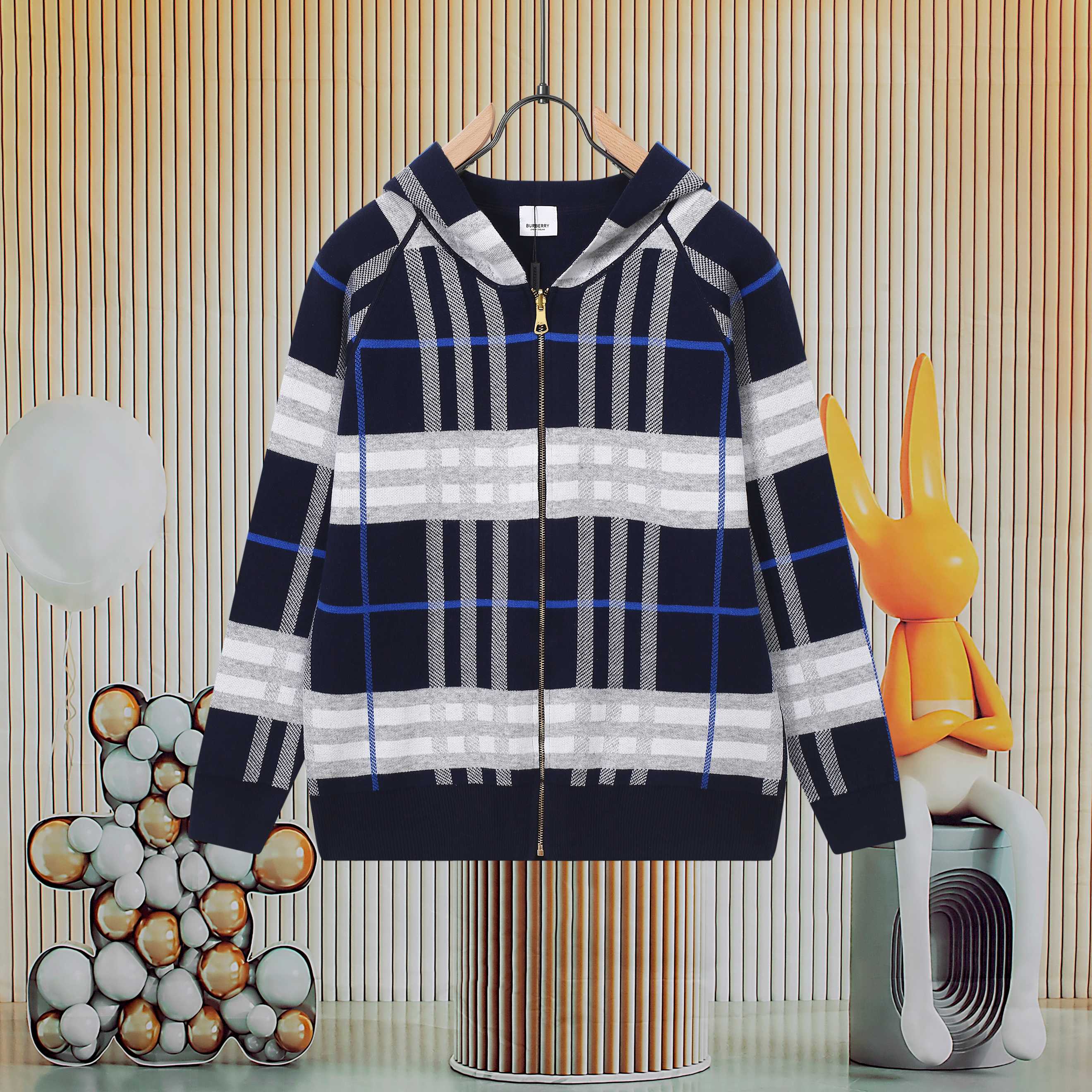 Children's navy hooded jacket with white and blue plaid stripes and front zipper