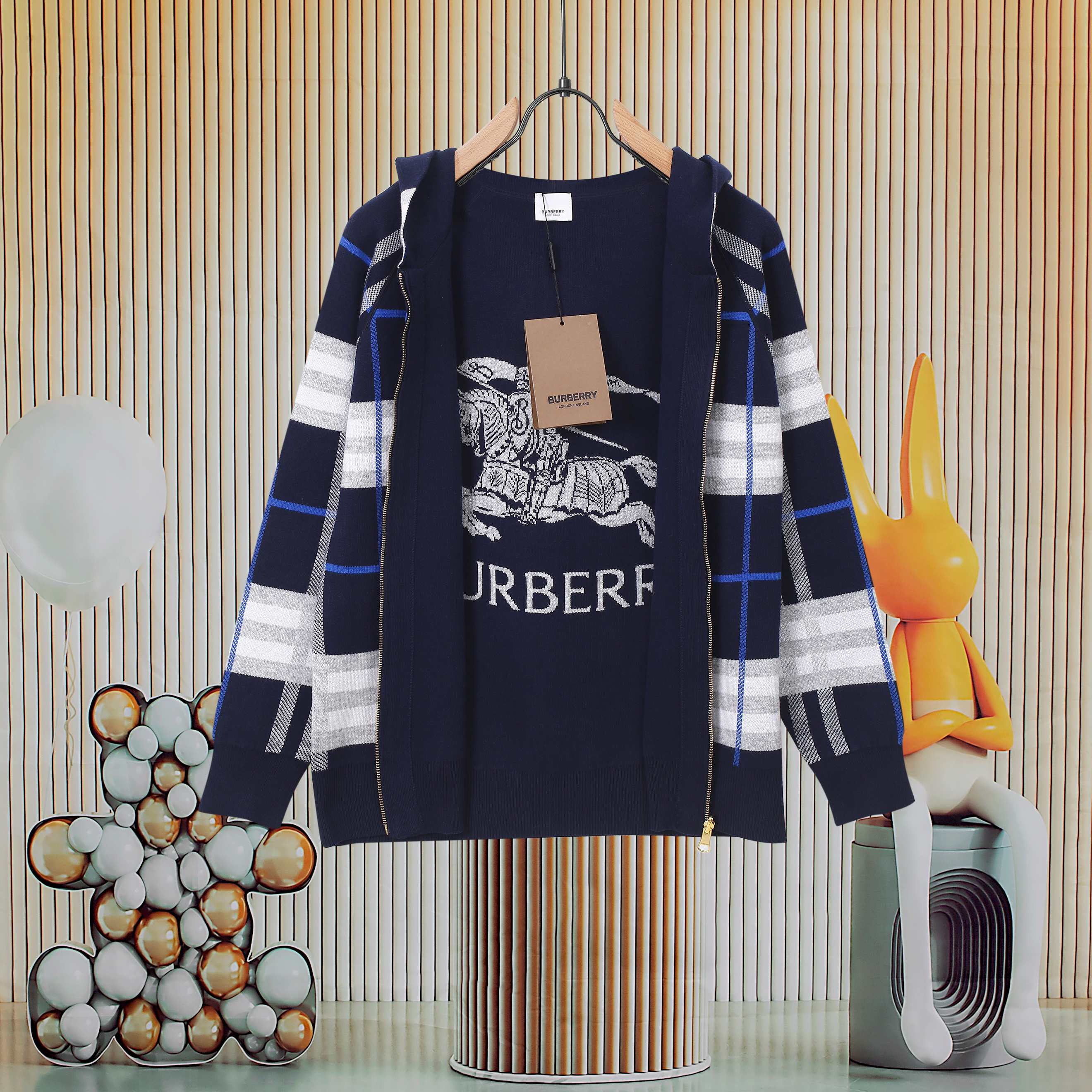 Children's navy plaid hoodie jacket with zip front, hood, and graphic chest print