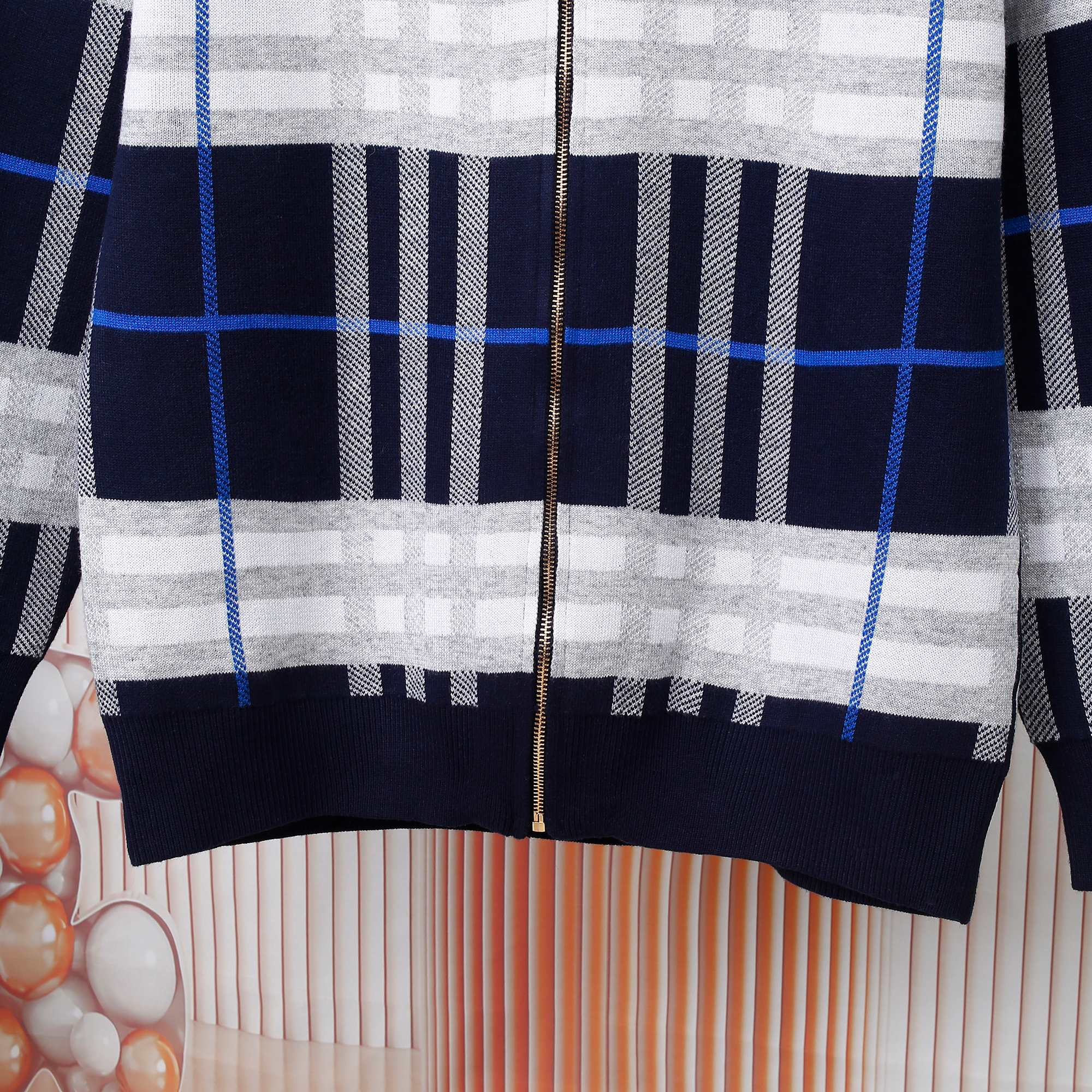 Children's navy plaid zip hoodie with gold-tone zipper and ribbed hem