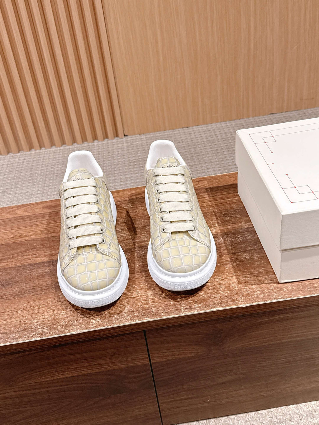 Alligator-embossed leather sneakers, cream uppers with white lace-up soles