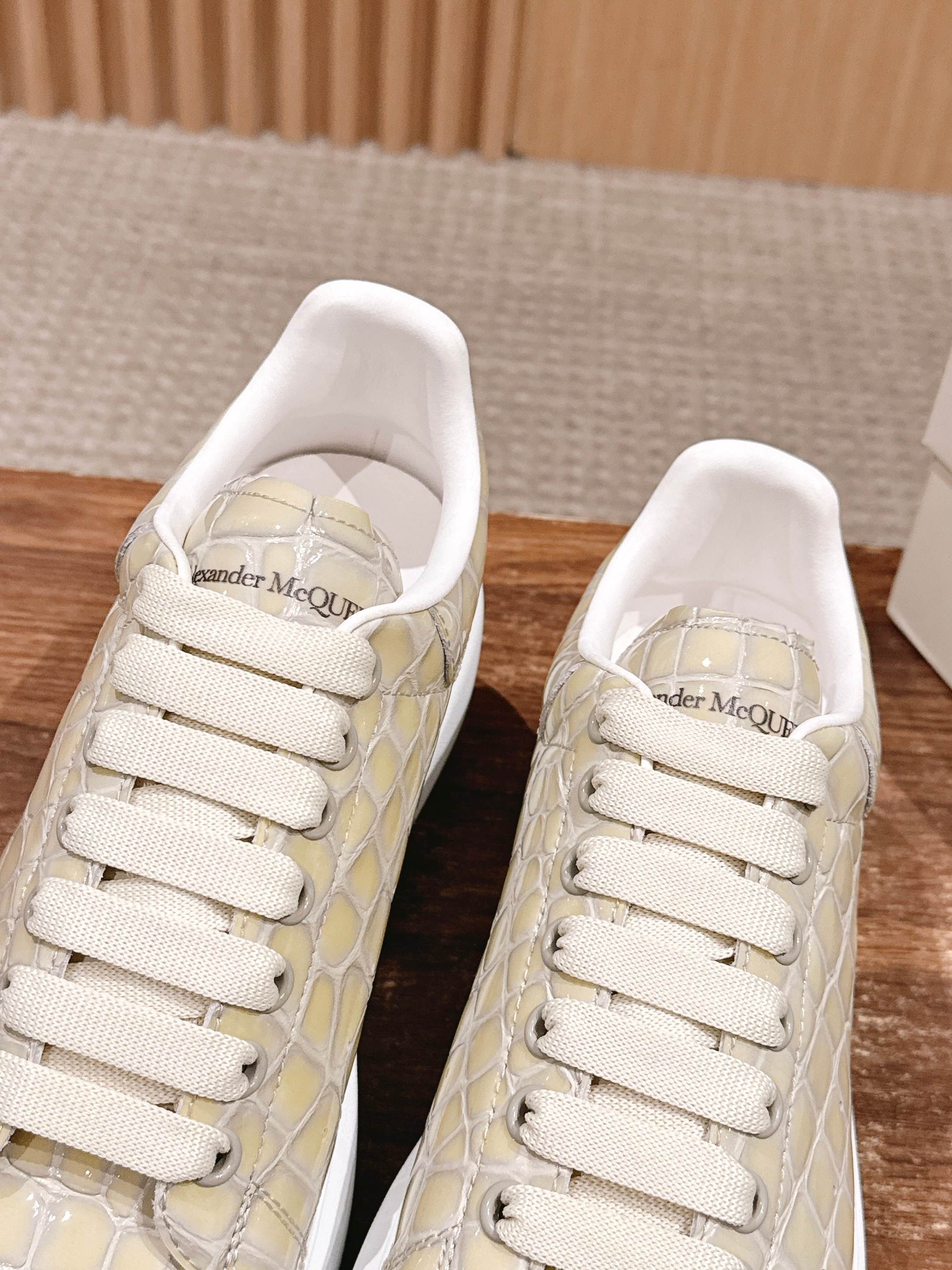 Cream alligator-embossed leather sneakers with Alexander McQueen logo on tongue