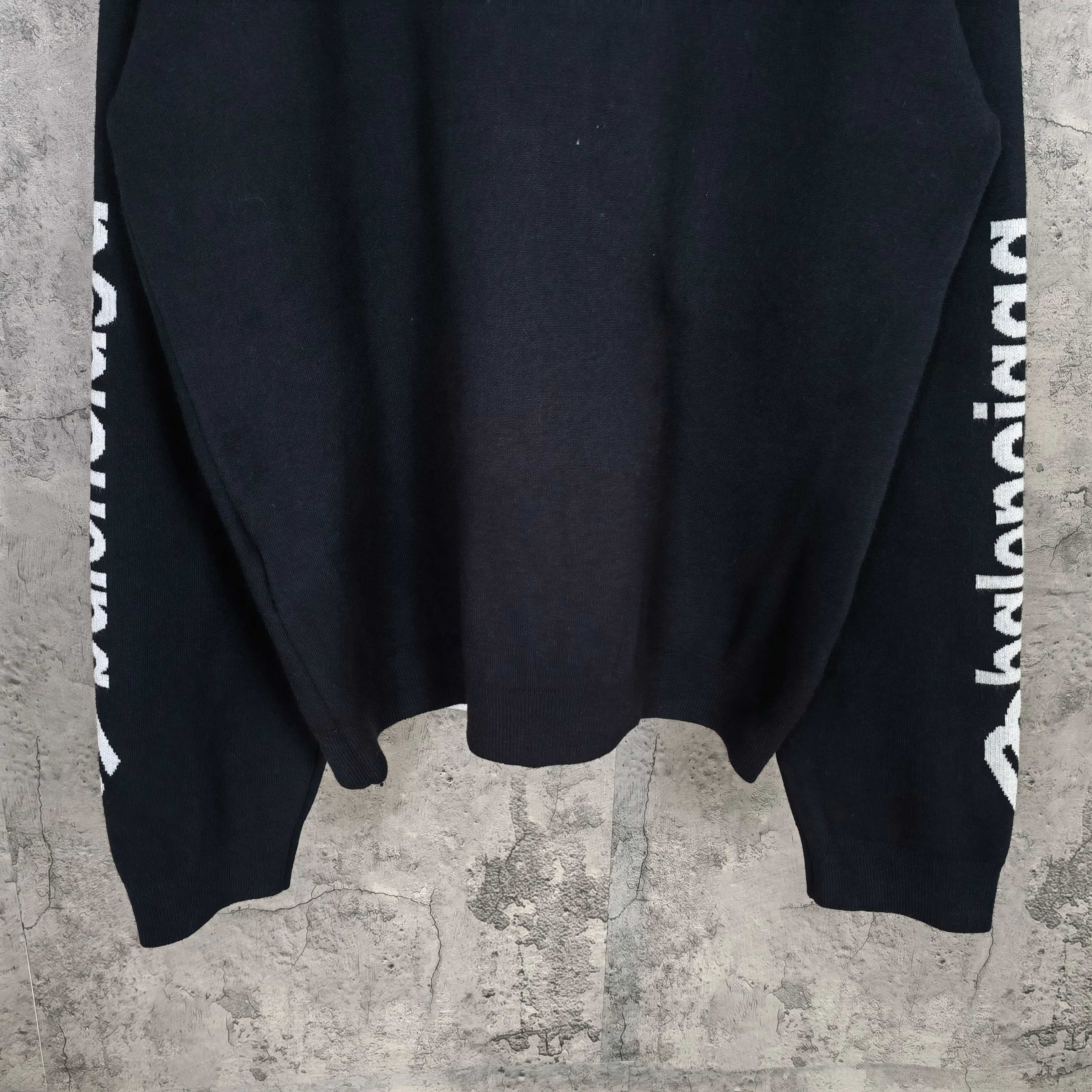 Balenciaga long-sleeve sweatshirt, dark navy with white logo on sleeve