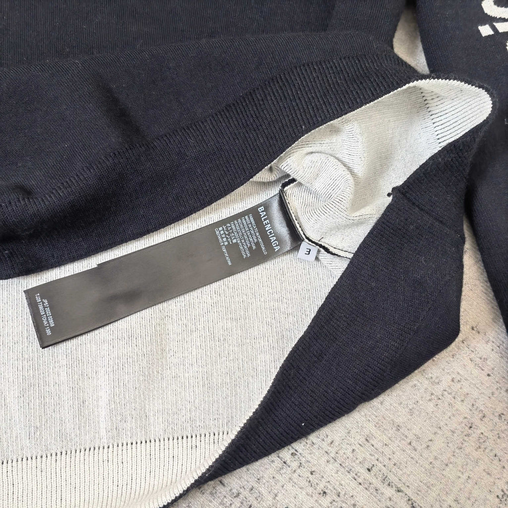 Balenciaga long-sleeve sweatshirt, dark navy with neck ribbing and brand tag