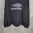 Black long-sleeve shirt with Balenciaga logo print across chest