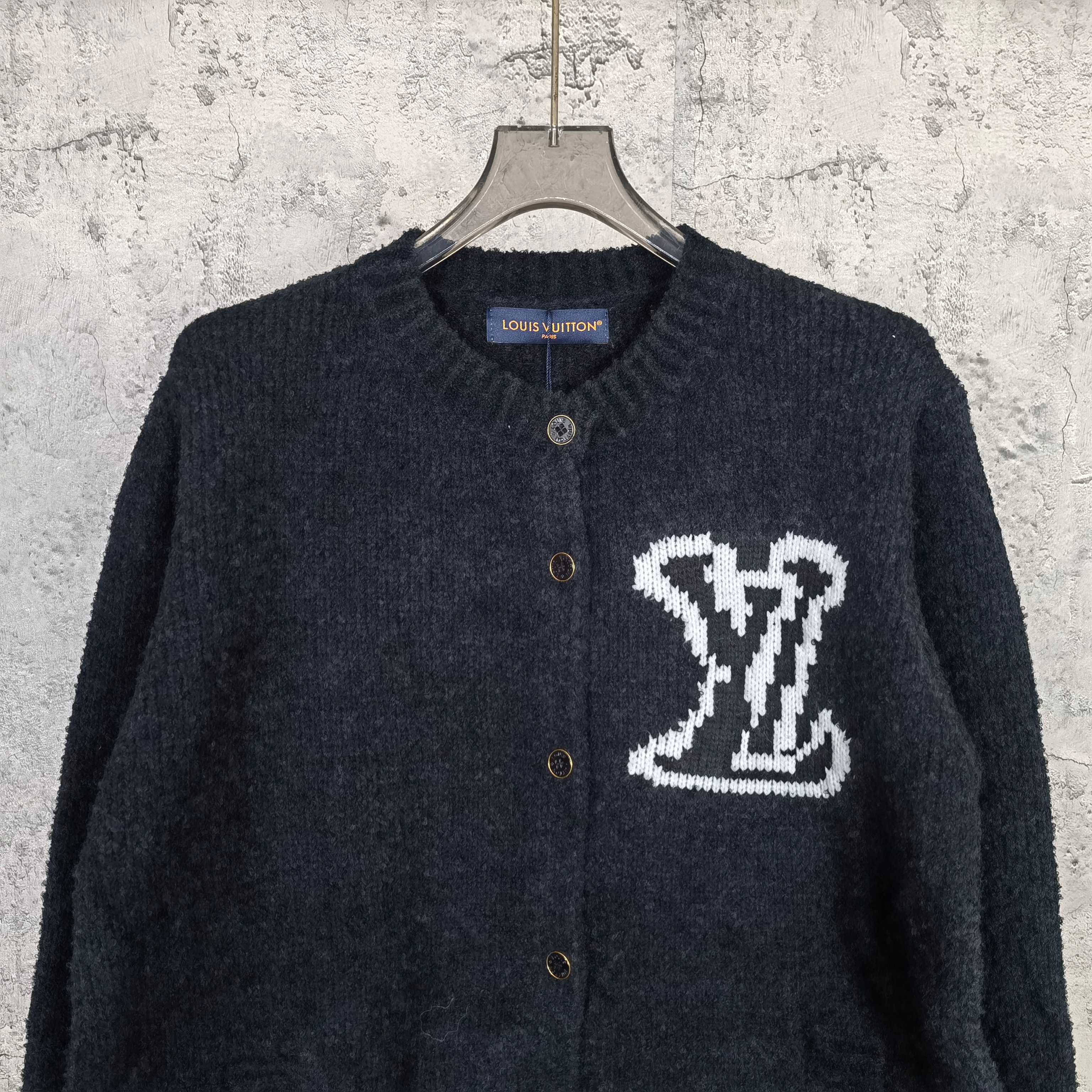 Louis Vuitton dark knit cardigan with button front and white LV monogram