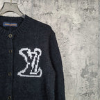 Louis Vuitton dark knit cardigan with white LV monogram on chest