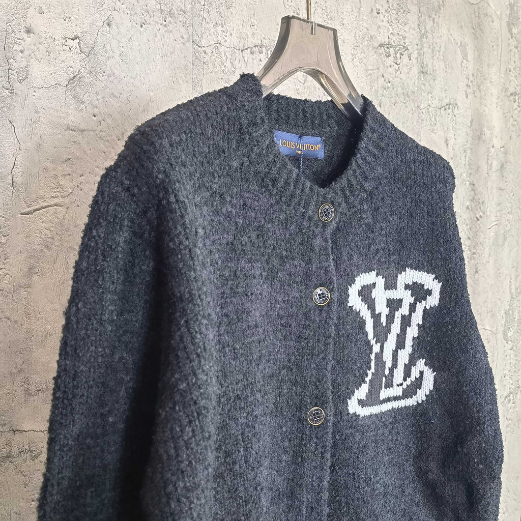 Louis Vuitton dark knit cardigan with white LV monogram on chest