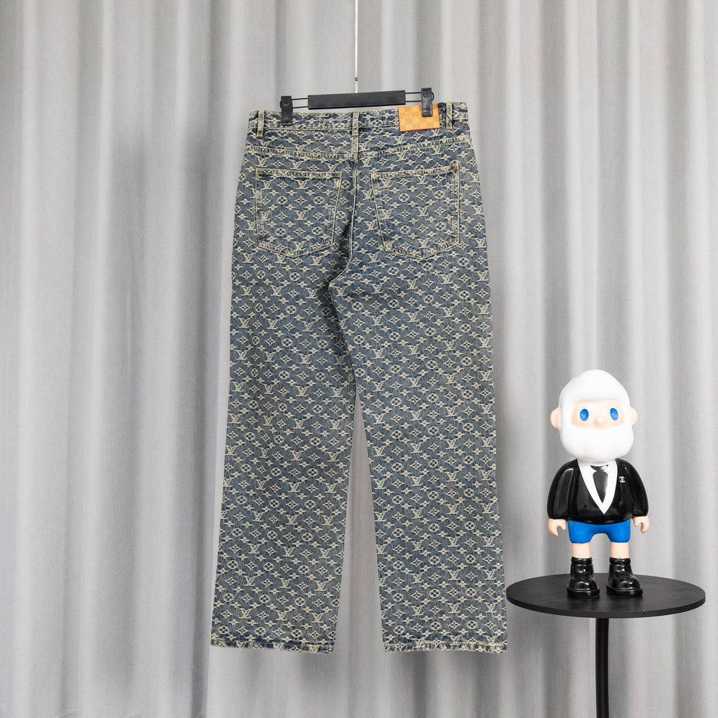 Louis Vuitton monogram denim pants with orange side stripe and belt loops