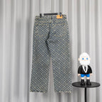 Louis Vuitton monogram denim pants with orange side stripe and belt loops