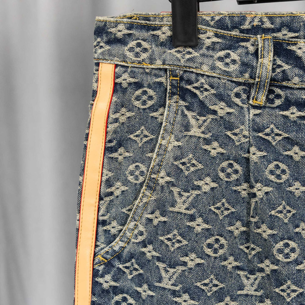 Louis Vuitton monogram denim pants side seam with orange stripe and belt loop