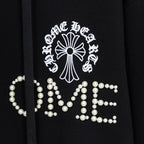 Black hoodie with pearl-studded crest and large beaded lettering on front