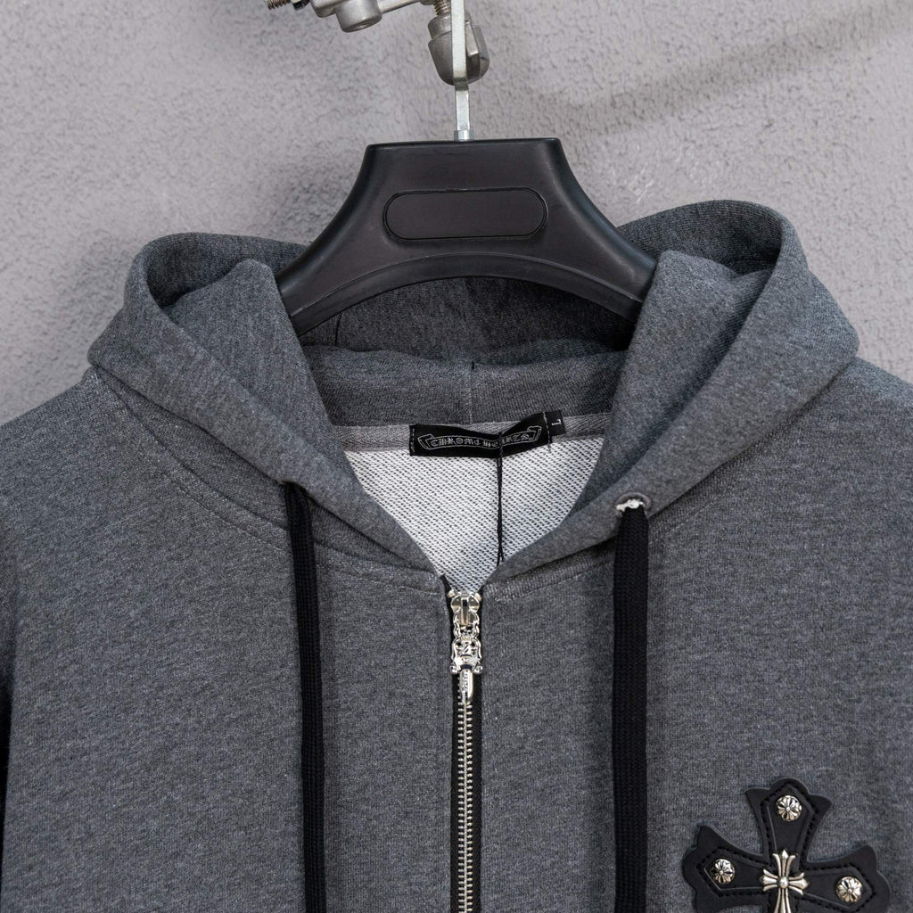 Grey hooded zip-up jacket with silver zipper and cross chest detail