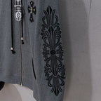 Grey hoodie sleeve panel with large black ornate floral design