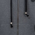 Grey zip-up hoodie close-up of silver zipper and front pockets
