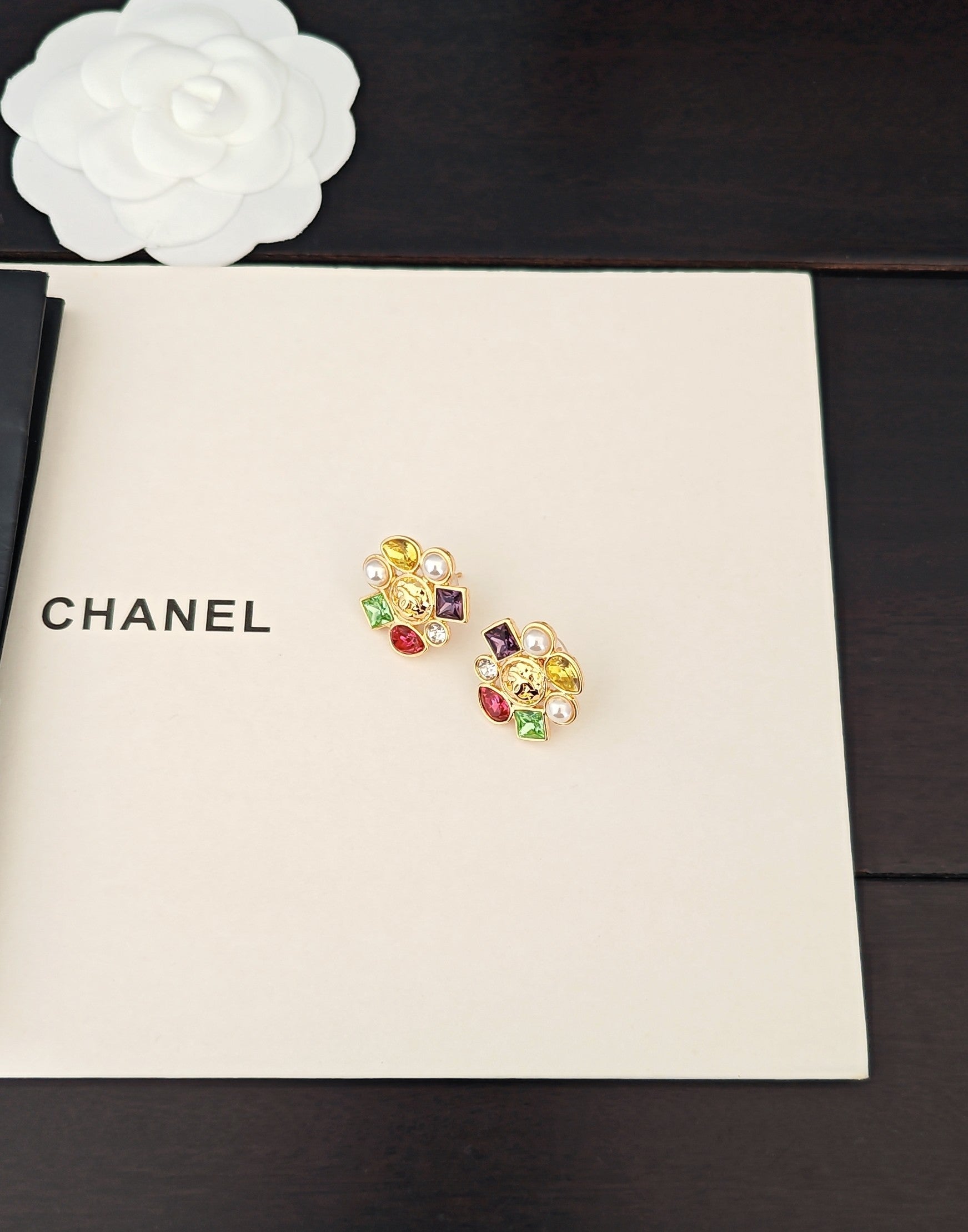 Gold-tone Chanel stud earrings with pearl accents and multicolor crystal charms