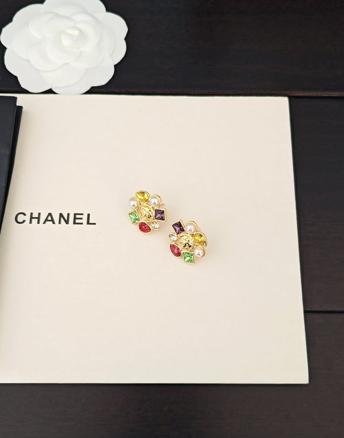 Gold-tone Chanel stud earrings with pearl accents and multicolor crystal charms