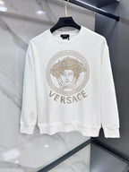 White crewneck sweatshirt with gold Versace rhinestone medallion logo