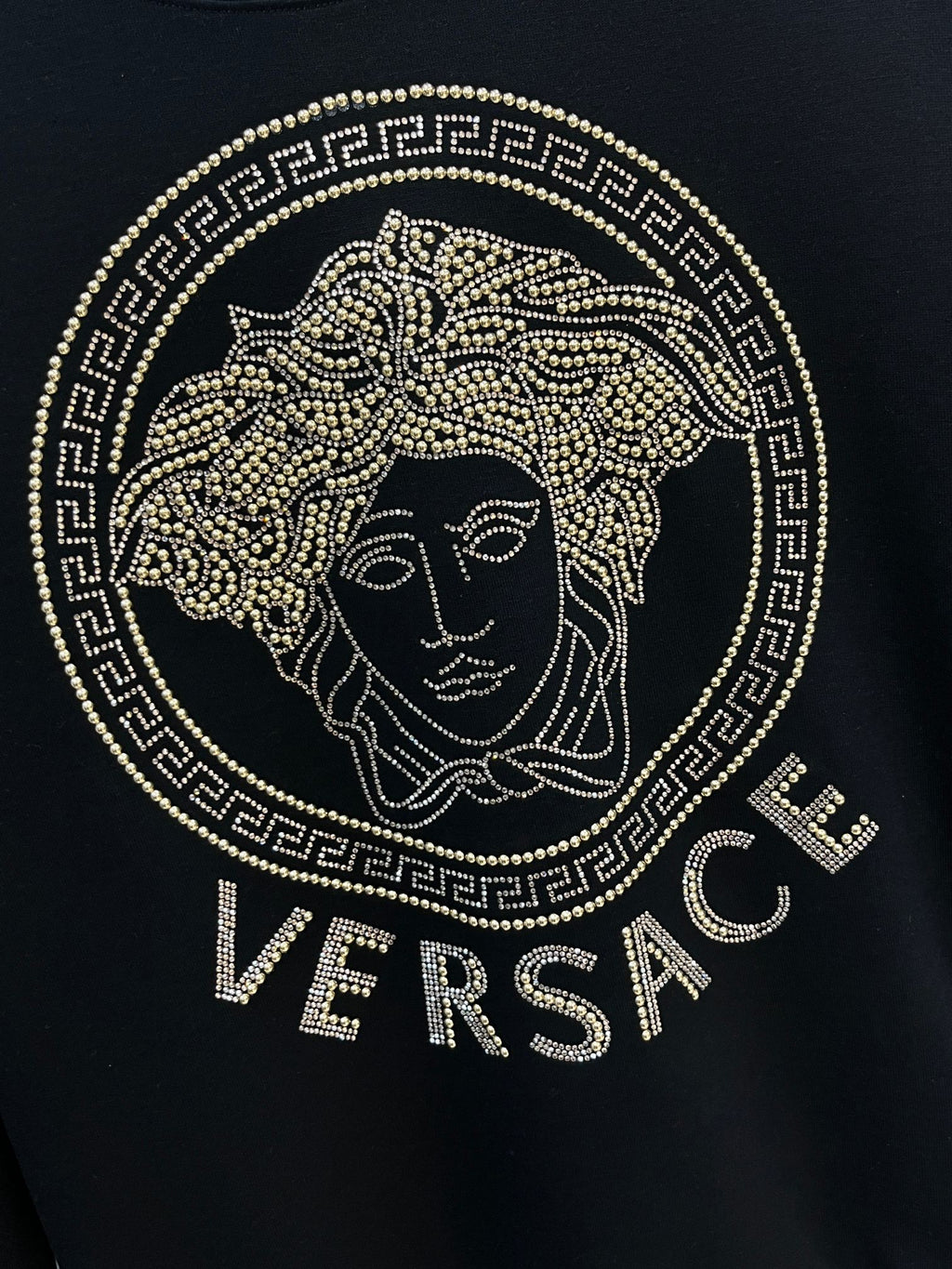 Dark Versace sweatshirt with gold rhinestone Medusa and VERSACE text logo on chest