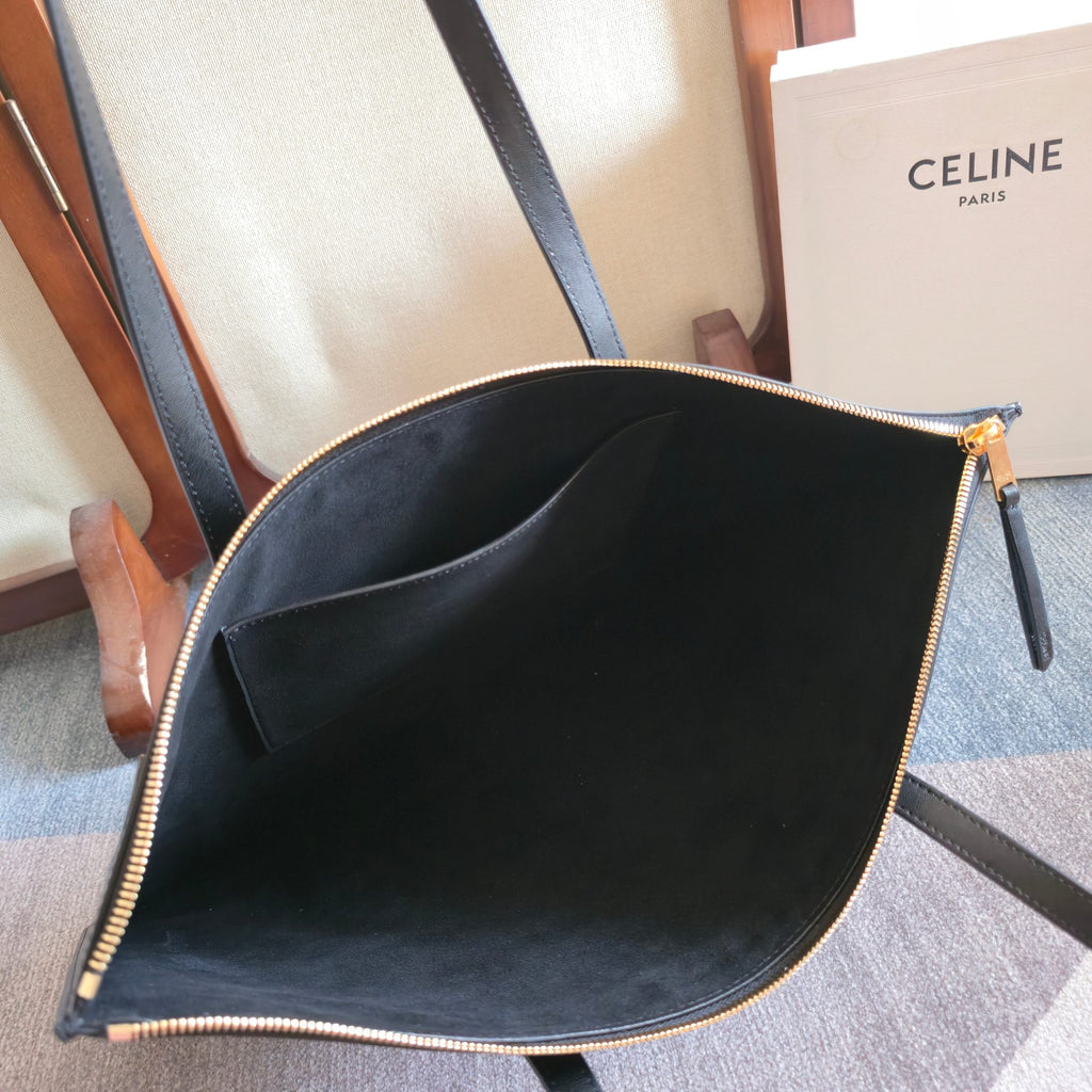 CELINE tote bag open top showing interior, zip closure and gold-tone hardware.