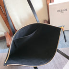 CELINE tote bag open top showing interior, zip closure and gold-tone hardware.