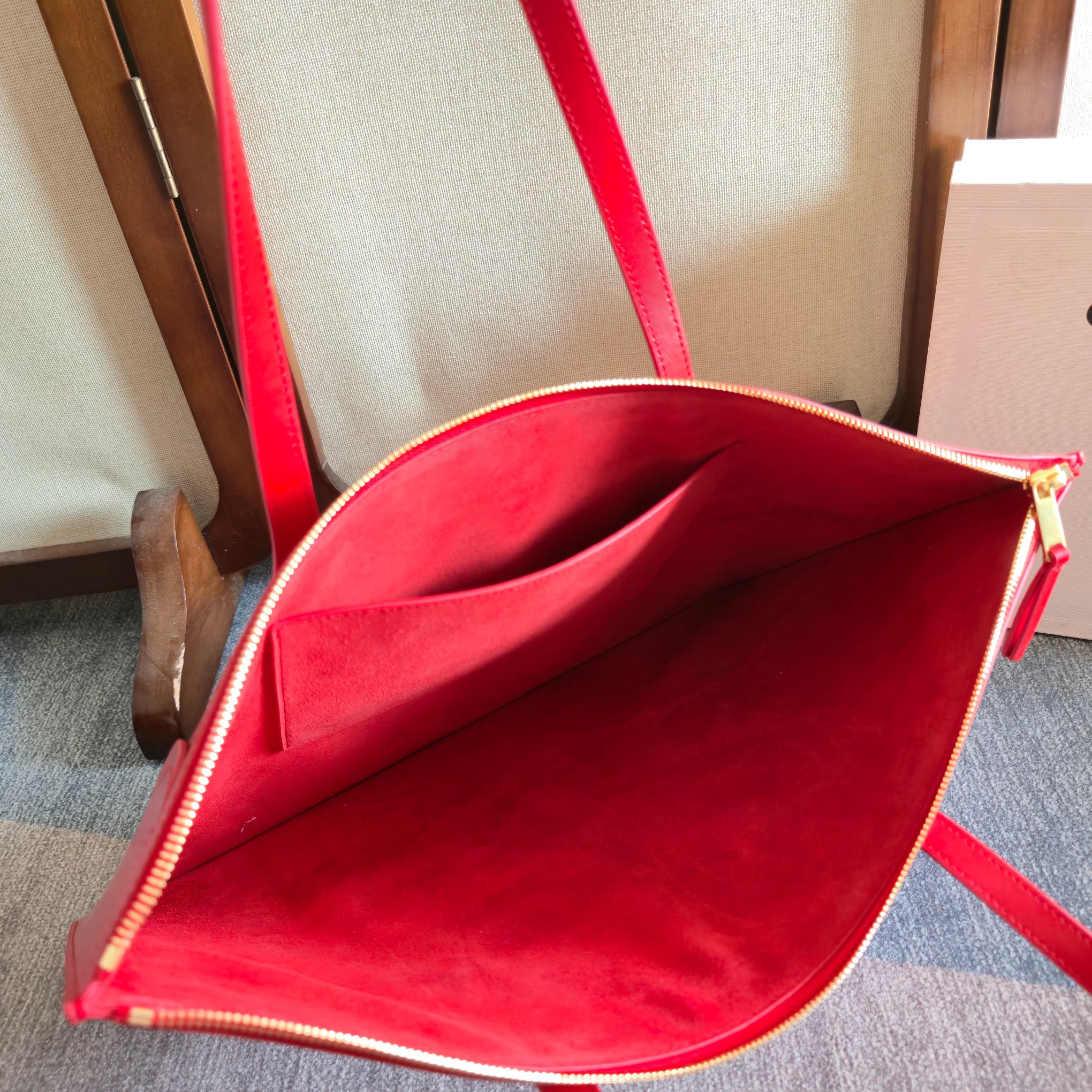 Celine tote bag open interior in bright red leather with zip top and inner lining