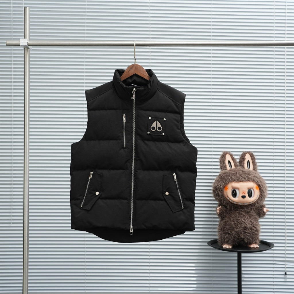 Long quilted puffer vest with full front zip, black sleeveless design