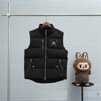 Long quilted puffer vest with full front zip, black sleeveless design