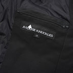 Moose Knuckles fabric label inside vest showing size L/ LG
