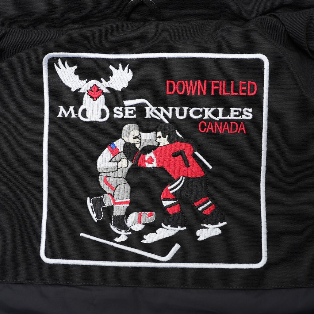 Down filled Canada label patch on inside lining of puffer vest