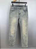 Washed light-blue denim jeans with belt loops and five-pocket styling
