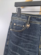 Dark blue denim pants back with two pockets and PRADA patch on waistband.