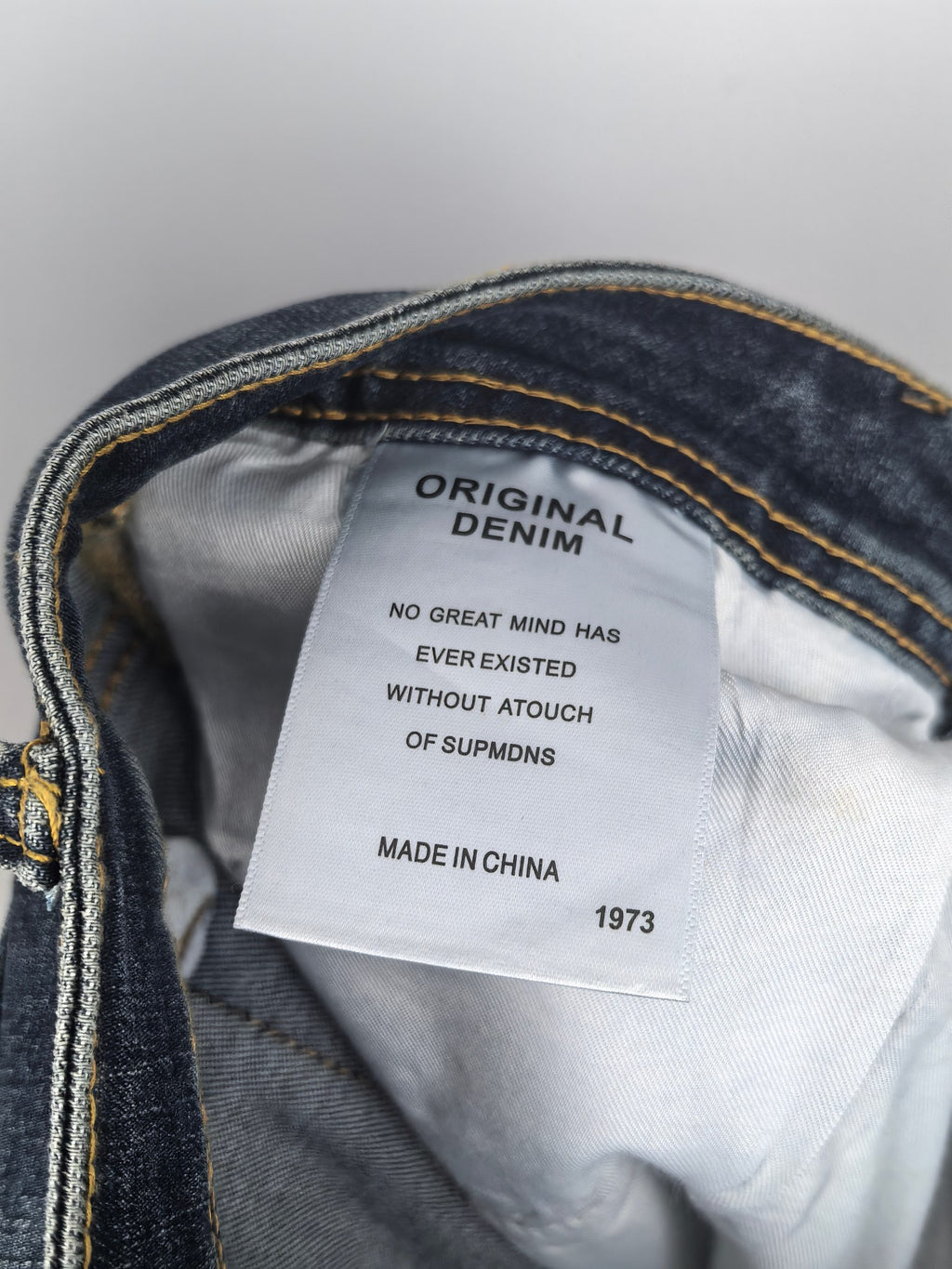 Denim care label with text, made in China, 1973.