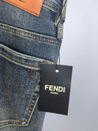 Fendi-tagged blue denim pants with embroidered logo on front pocket