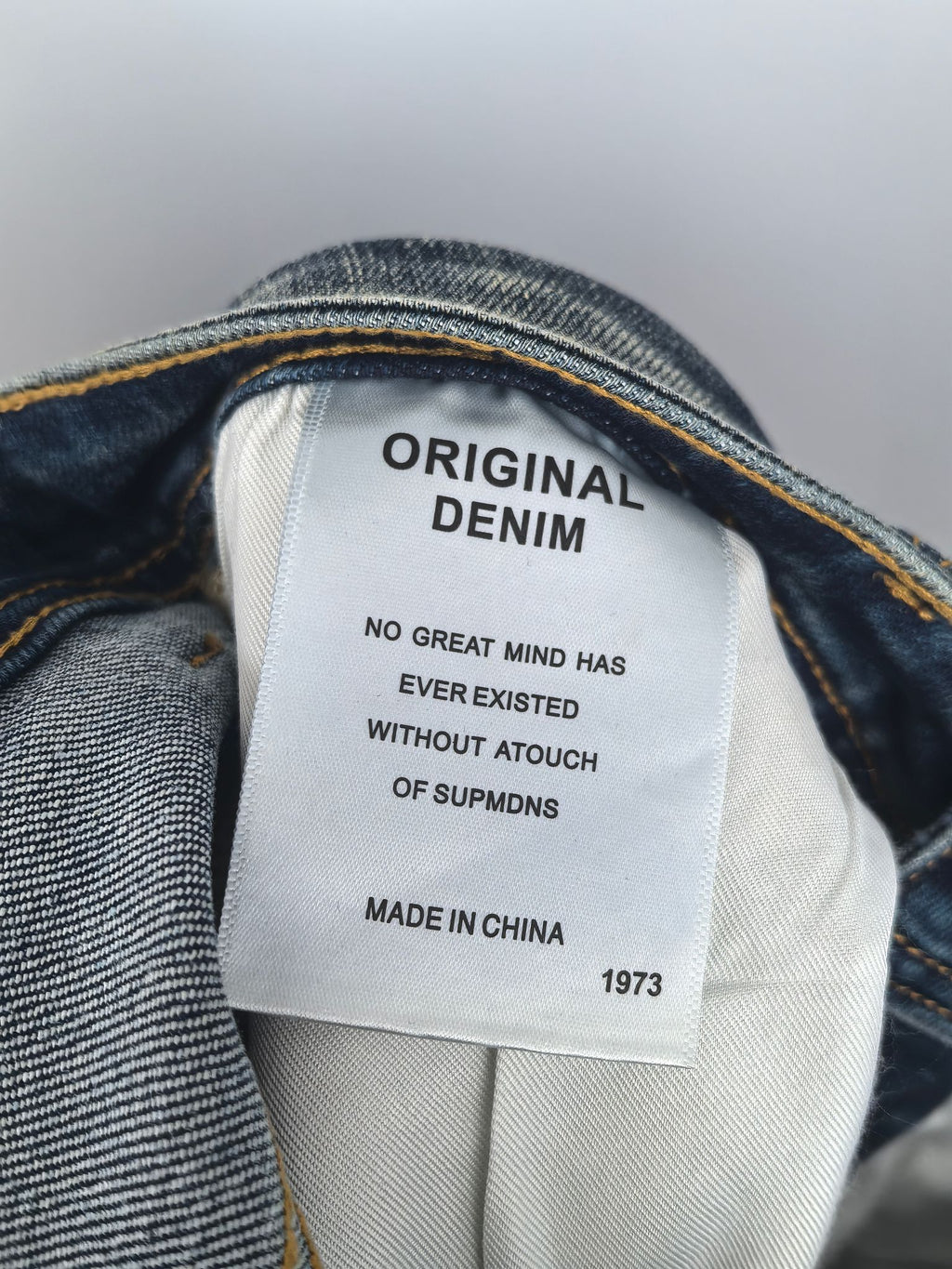 Denim care label reading ORIGINAL DENIM and MADE IN CHINA 1973