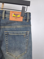 Blue denim pants back with embroidered logo on back pocket