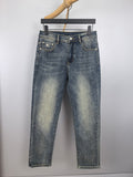 Burberry denim jeans with dark blue wash, belt loops and button fly