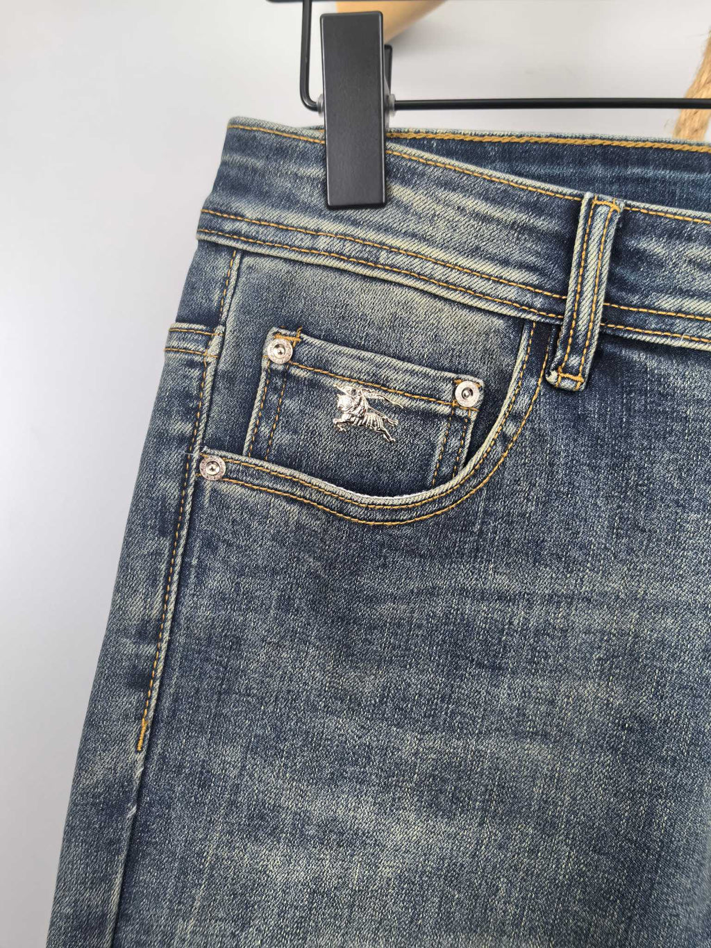 Burberry denim pants back pocket with stitched flap and button, dark blue