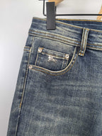 Burberry denim pants back pocket with stitched flap and button, dark blue