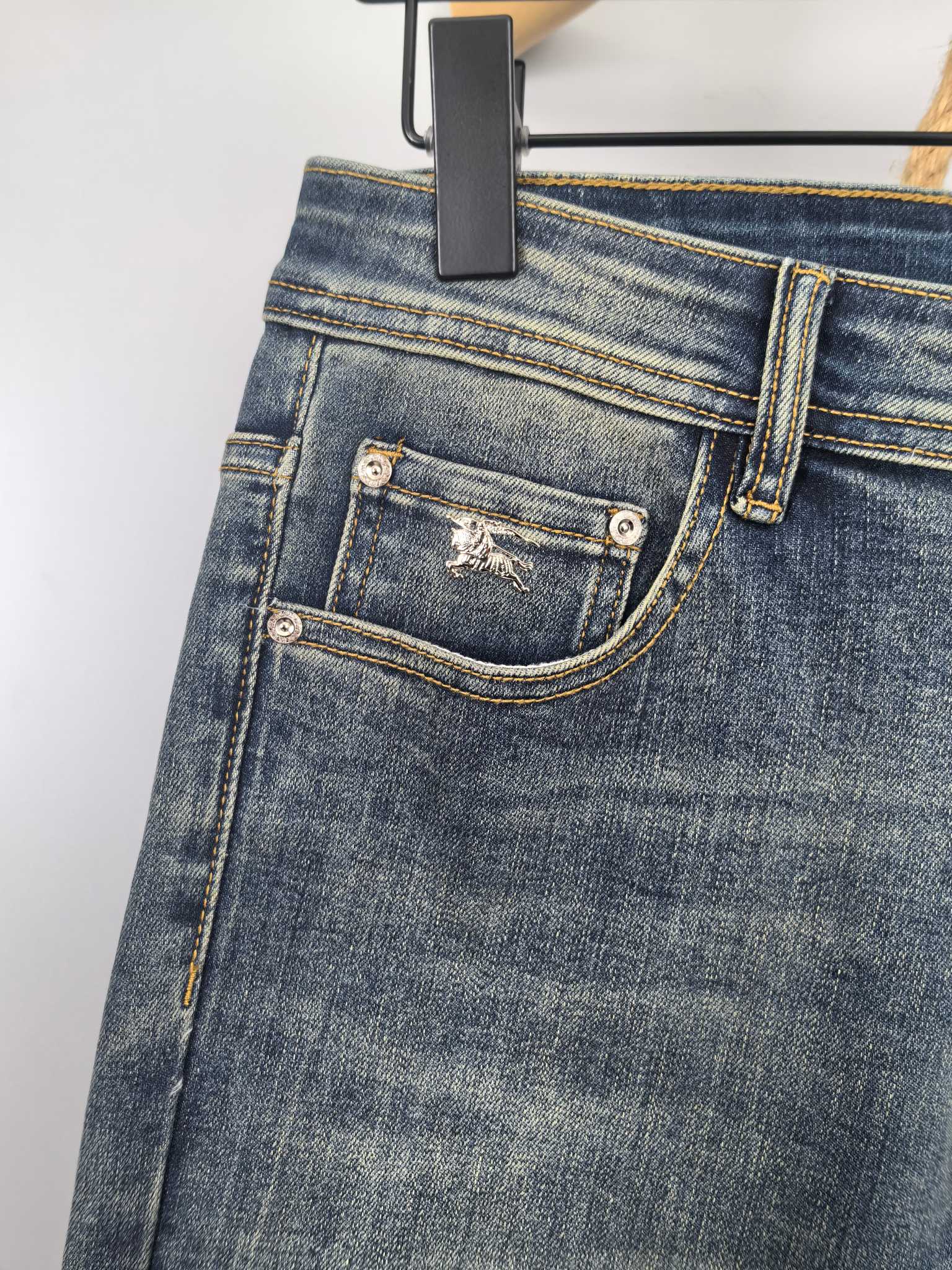 Burberry denim pants back pocket with stitched flap and button, dark blue