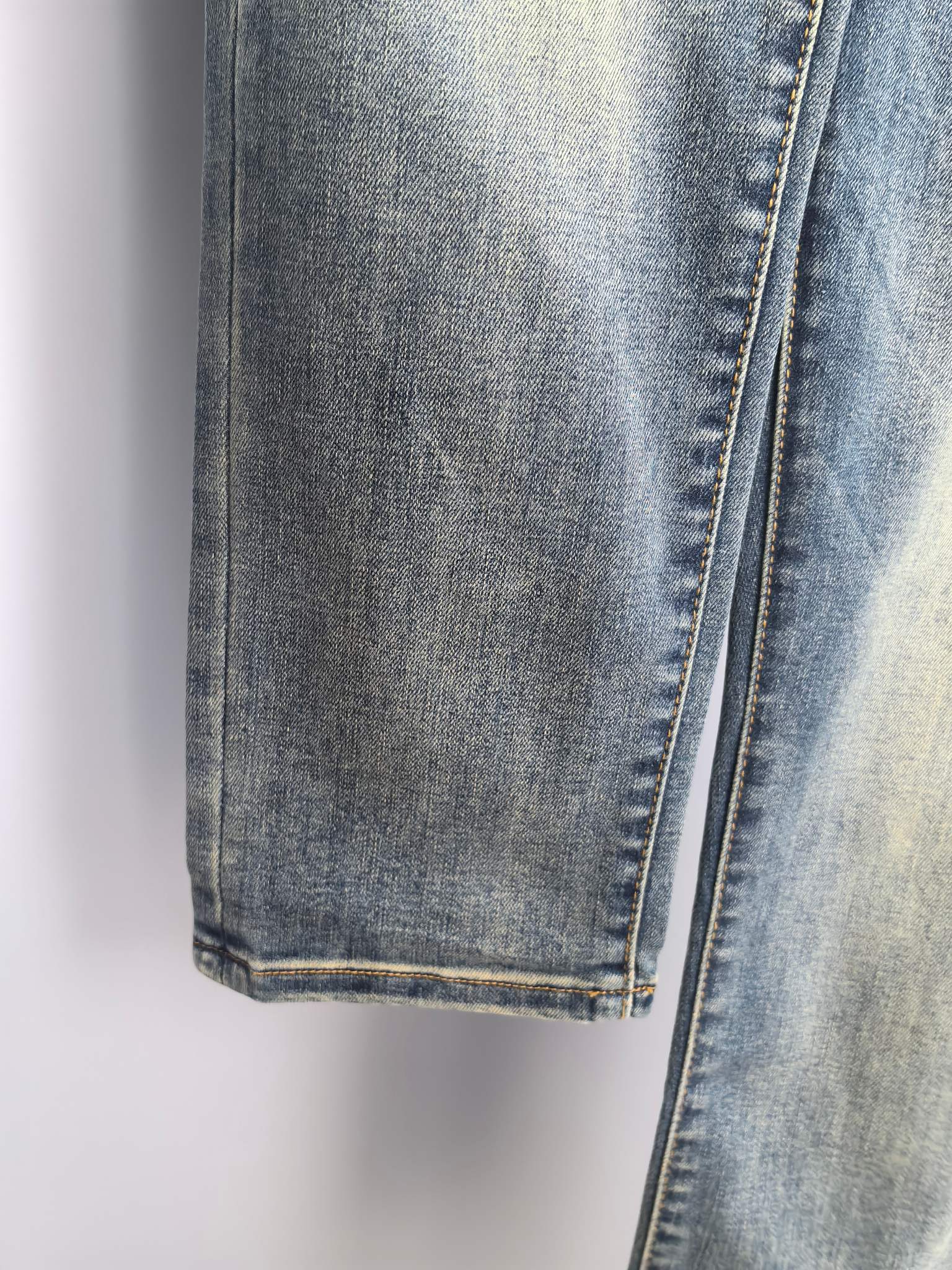 Burberry denim pant leg hem with stitched cuff, dark blue denim