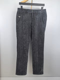 Charcoal textured trousers with belt loops, zip fly, button closure, and straight legs.