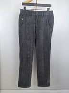 Charcoal textured trousers with belt loops, zip fly, button closure, and straight legs.