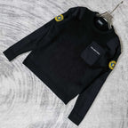 Balenciaga long-sleeve knit sweater, laid flat, with logo chest patch and sleeve crest