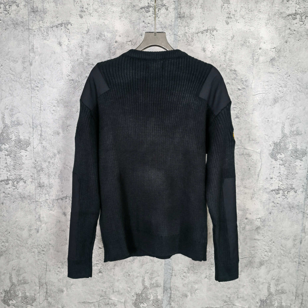 Balenciaga long-sleeve knit sweater, ribbed texture with crew neckline, back view on hanger