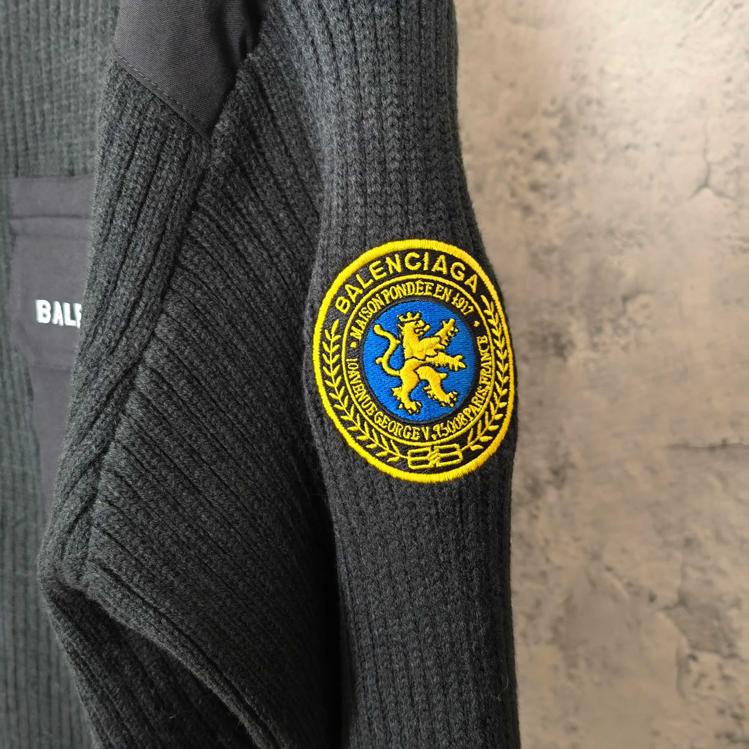 Balenciaga knit sweater sleeve crest patch on ribbed cuff