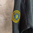Balenciaga knit sweater arm crest patch with blue lion inside yellow circular seal