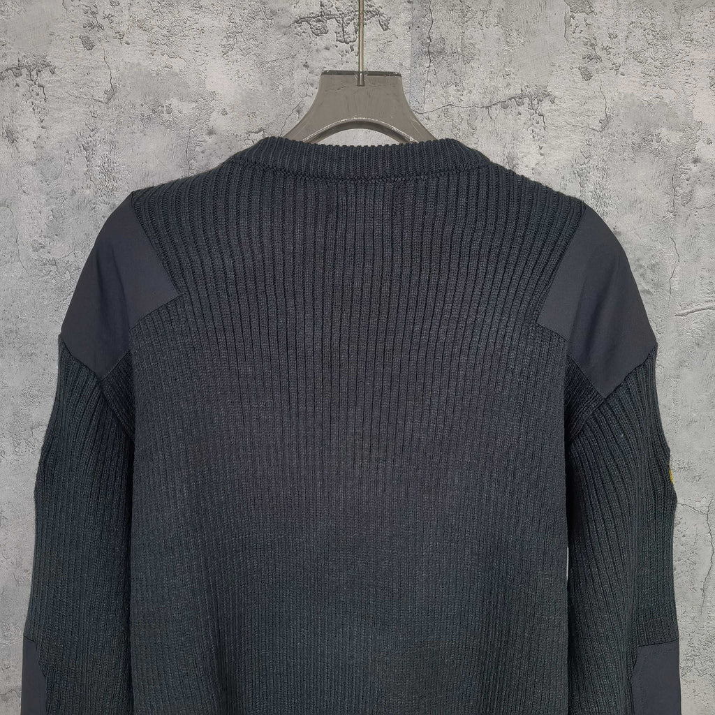 Balenciaga long-sleeve knit sweater back view with ribbed knit panels on hanger