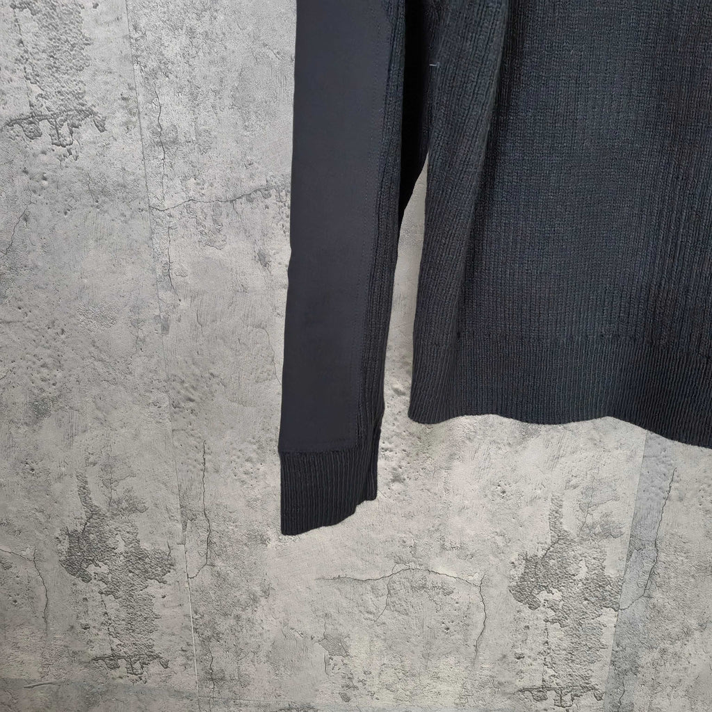 Long-sleeve knit sweater sleeve with ribbed cuffs and hem, dark